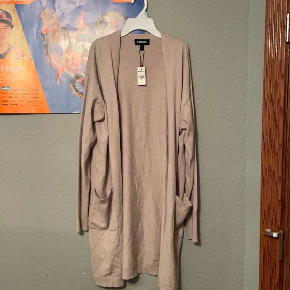 Cream colored small express cardigan